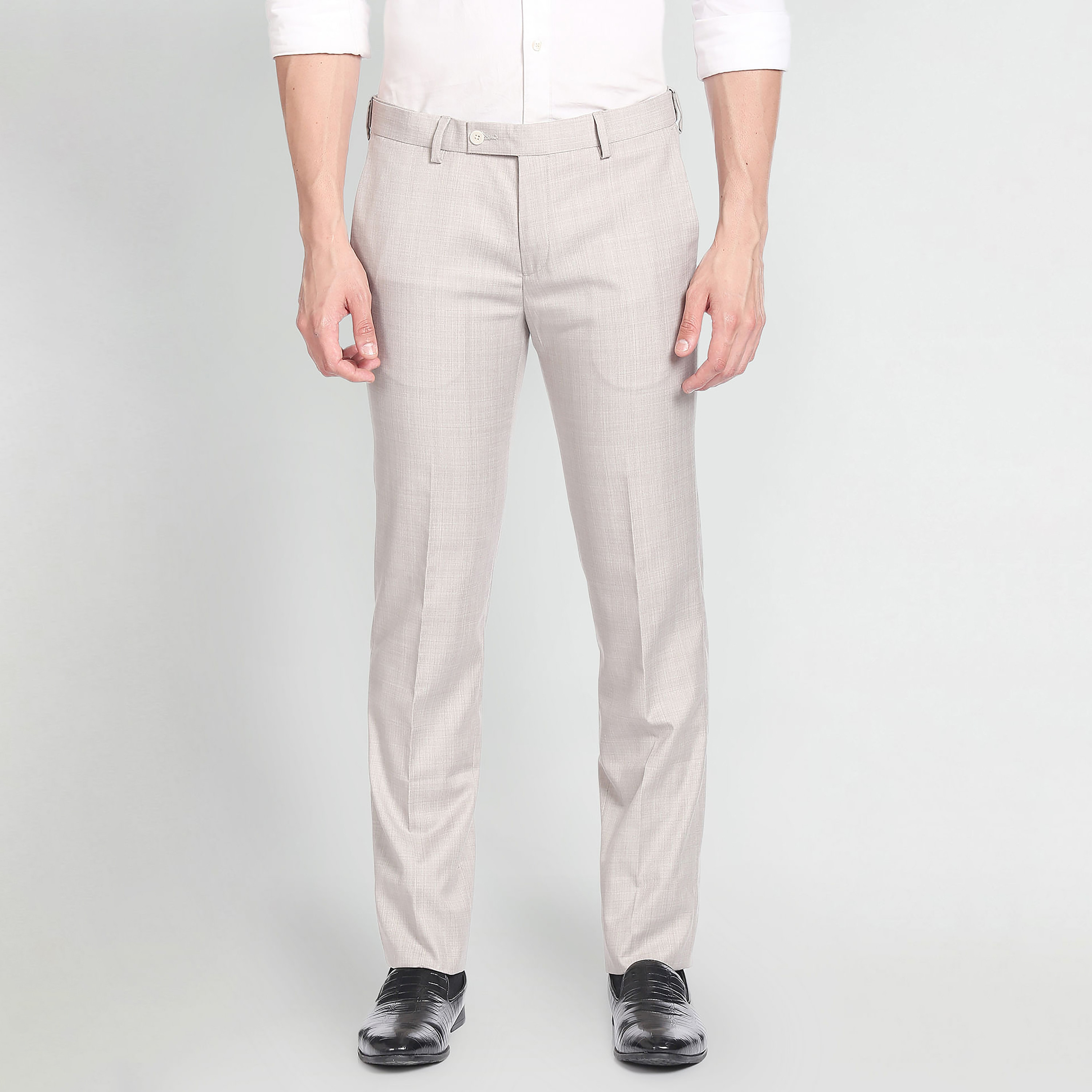Buy Arrow Mid Rise Dobby Solid Formal Trousers - NNNOW.com